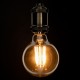 GloboStar® 99041 LED Long Filament Bulb E27 G95 Globe 12W 1080lm 360° AC 220-240V IP20 D9.5 x H13.5cm Ultra Θερμό Λευκό 2200K με Μελί Γυαλί - Dimmable - 3 Years Warranty
