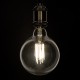 GloboStar® 99055 Λάμπα LED Long Filament E27 G125 Γλόμπος 12W 1320lm 360° AC 220-240V IP20 Φ12.5 x Υ18cm Φυσικό Λευκό 4000K με Διάφανο Γυαλί - Dimmable - 3 Years Warranty