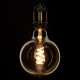 GloboStar® 99138 Λάμπα LED Soft S Spiral Filament E27 G125 Γλόμπος 4W 280lm 360° AC 220-240V IP20 Φ12.5 x Υ18cm Ultra Θερμό Λευκό 2200K με Μελί Γυαλί - Dimmable - 3 Years Warranty